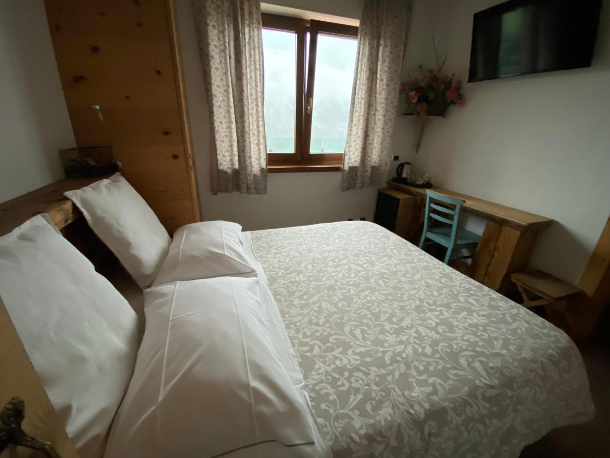 Bed and Breakfast Fra Rose E Mughi Домедже-ди-Кадоре Экстерьер фото